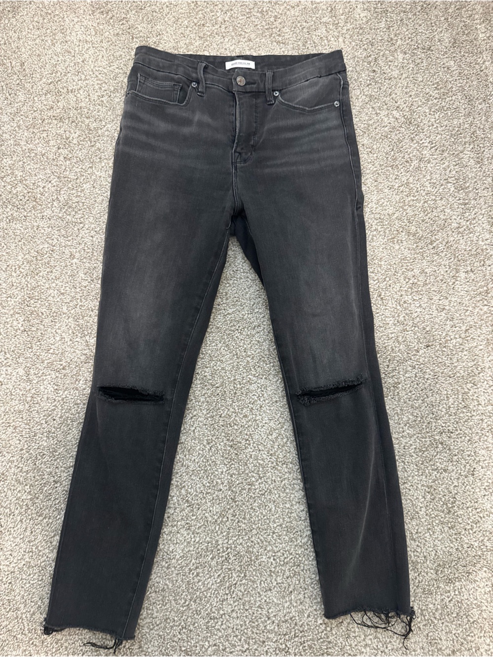 Good American Black Skinny High-Rise Jeans with Knee Rips